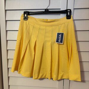 Yellow pleated skirt